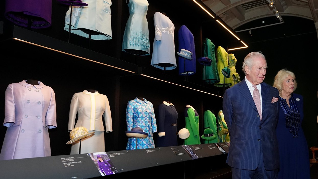 King Charles chuckles as he visits 'quirky' Queen Elizabeth II fashion exhibition to mark late monarch's 100th birthday