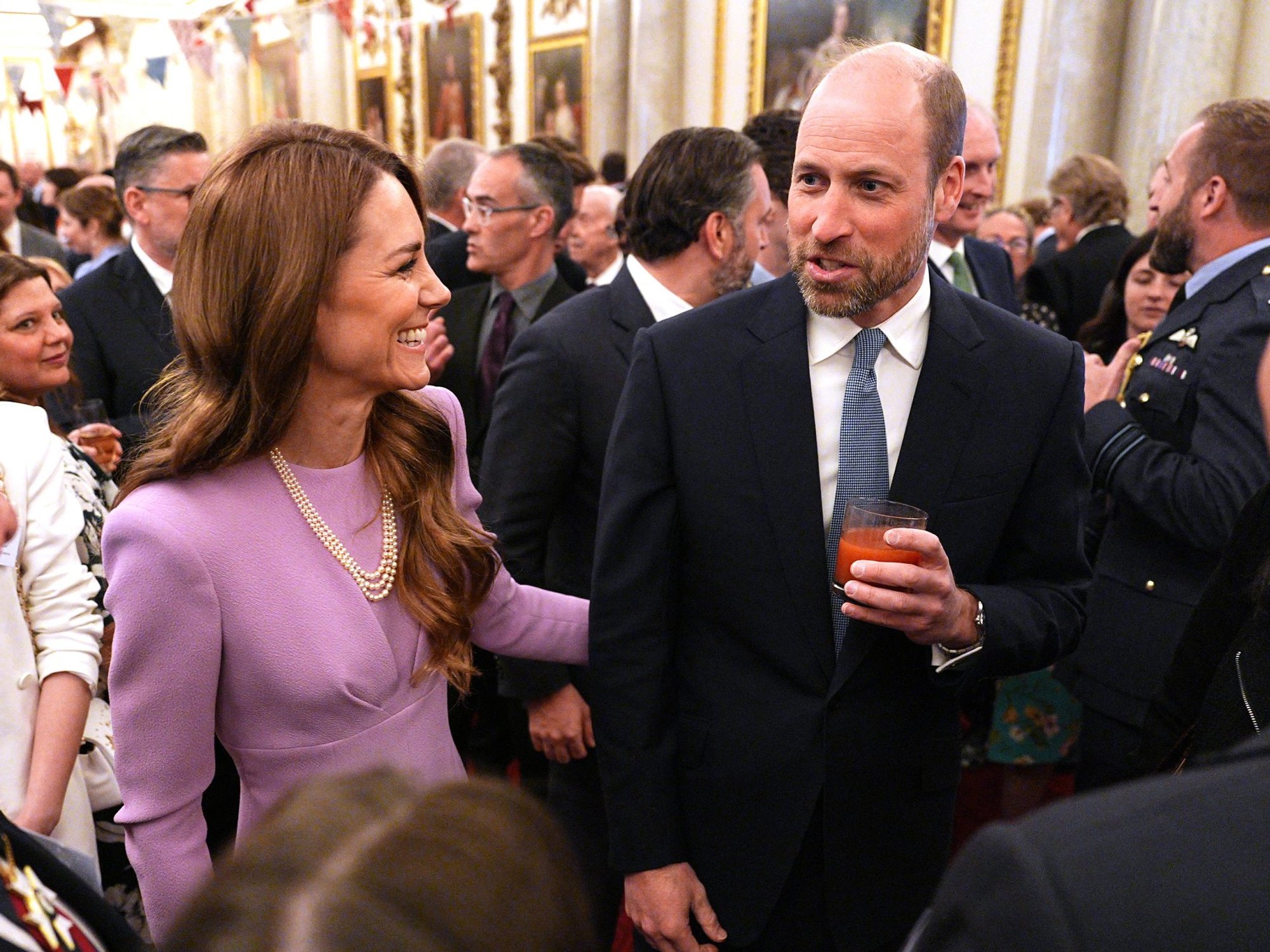 Princess of Wales left in stitches while King Charles leads rousing song during Queen Elizabeth c...