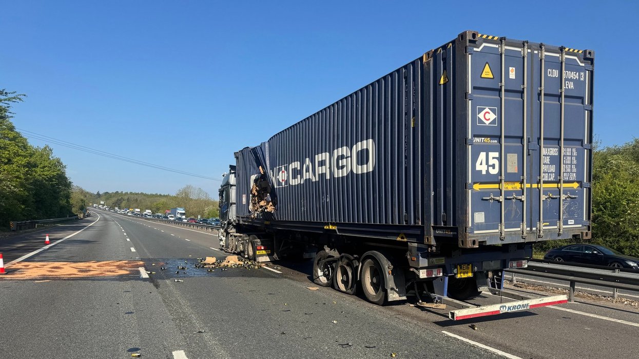 Major motorway shut for hours after being flooded with PROSECCO following lorry crash
