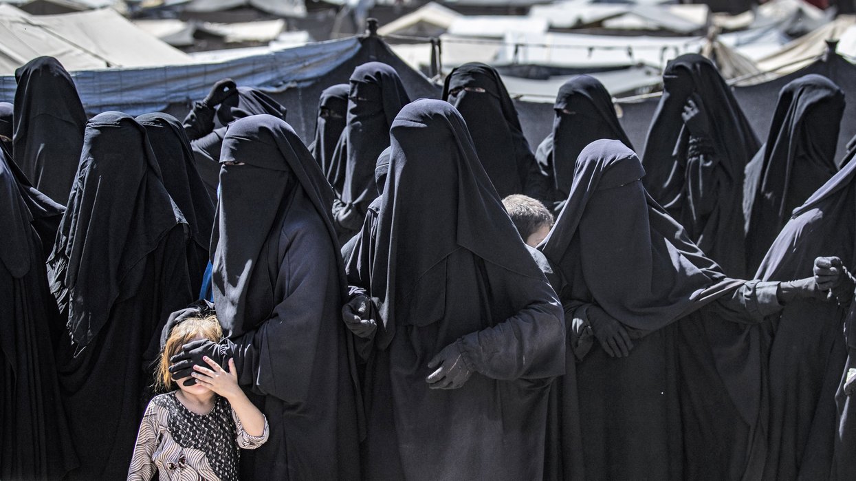 'Win for the radicals!' Australia welcomes more than a dozen Isis members from Shamima Begum's notorious Syrian camp