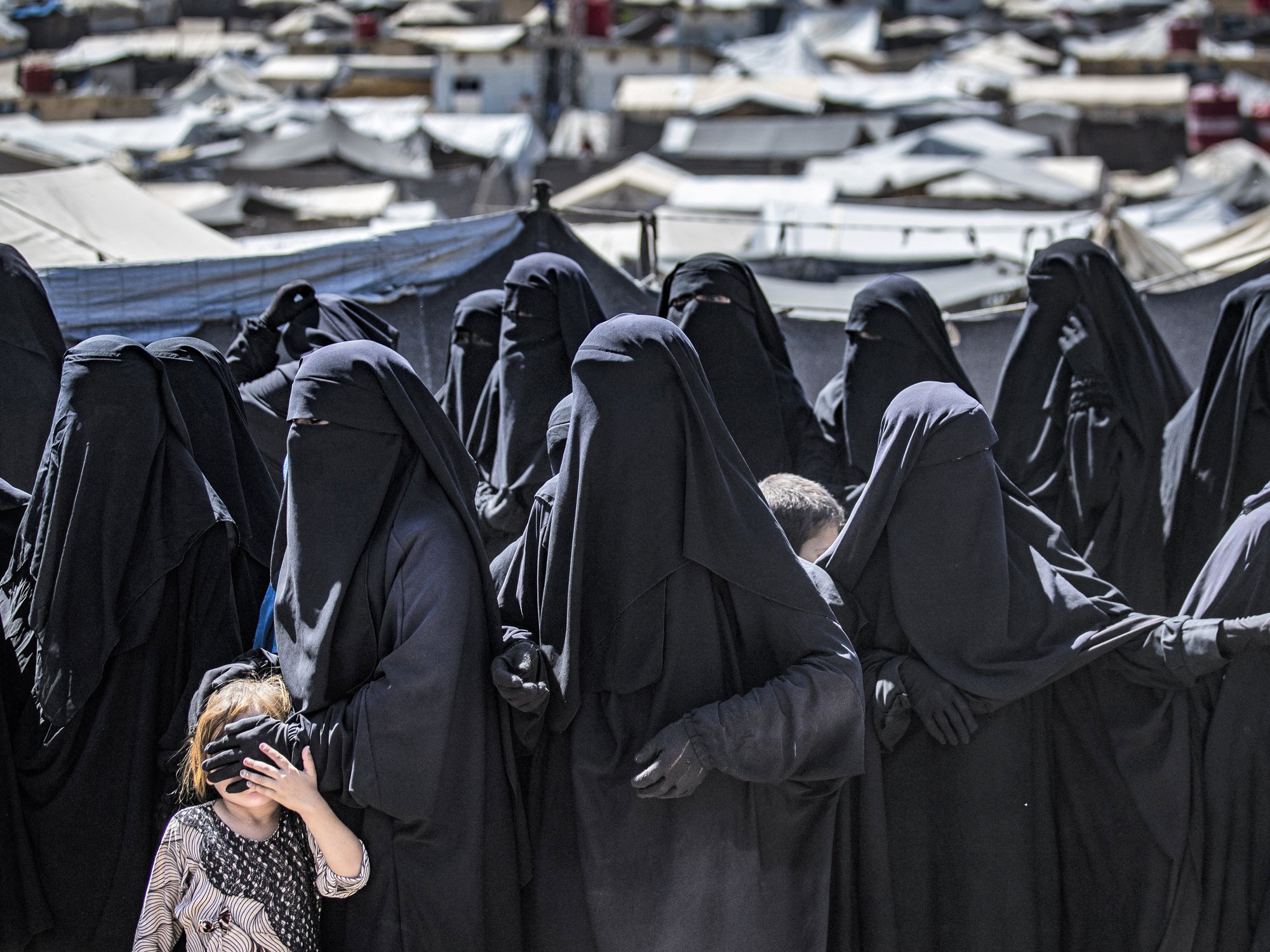 'Win for the radicals!' Australia welcomes more than a dozen Isis members from Shamima Begum's no...
