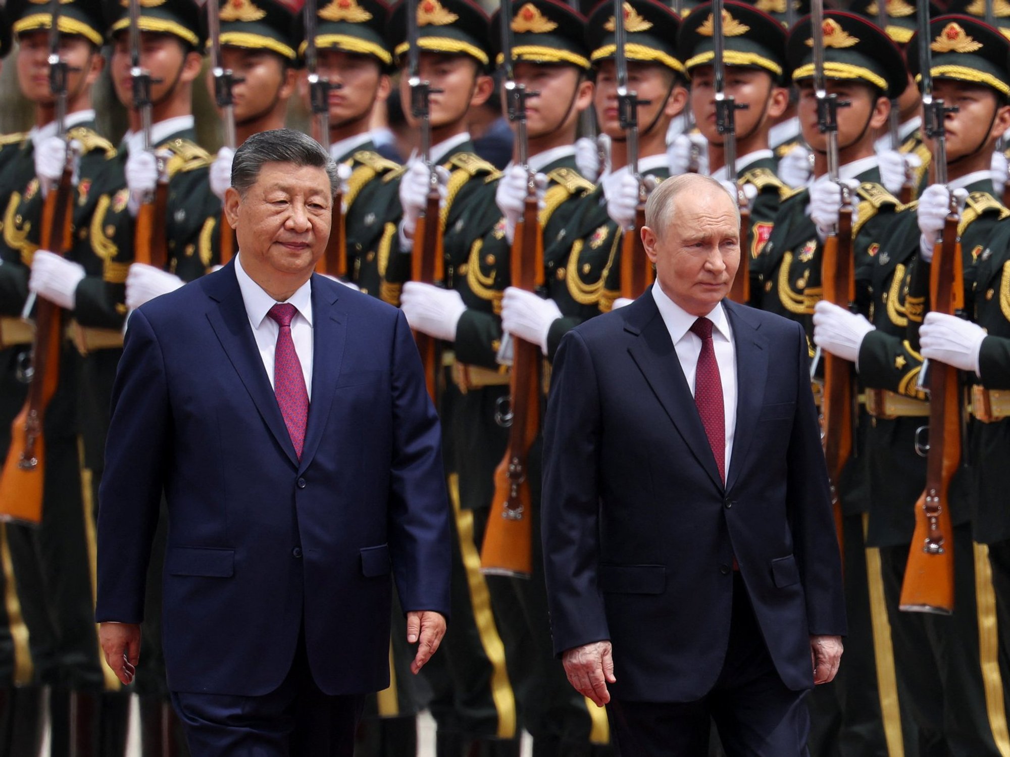 Vladimir Putin makes grovelling visit to China as Kremlin warns of 'catastrophic' war with Nato