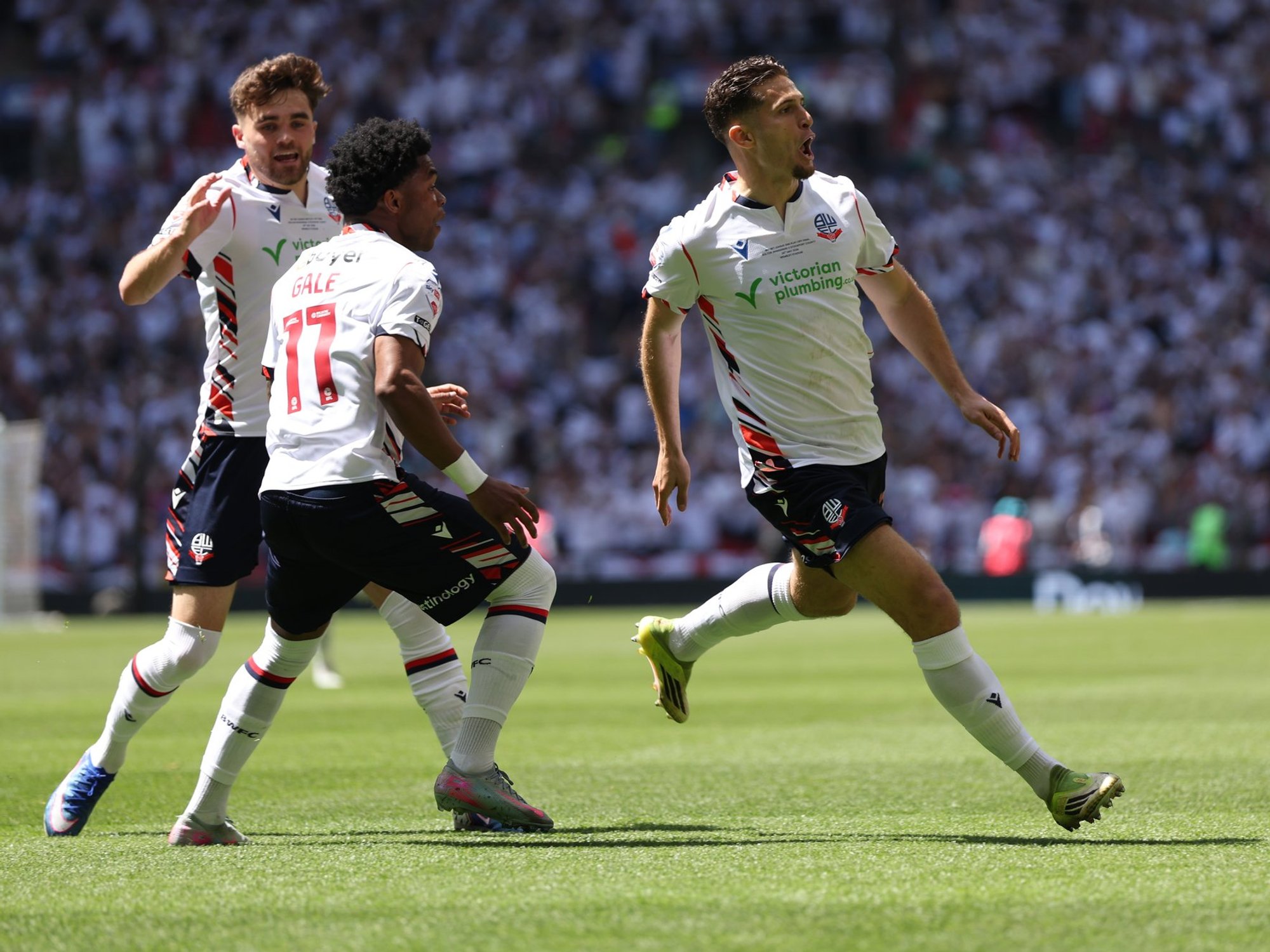Bolton secure Championship promotion as own goal, overhead kick and hair pull sinks Stockport