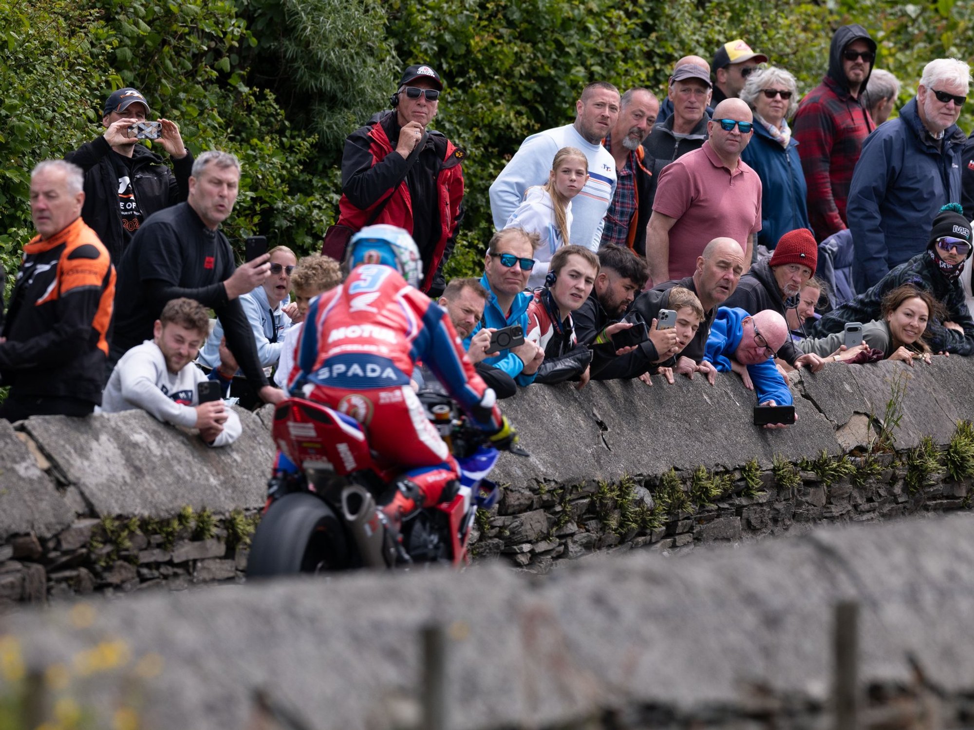 Isle of Man TT horror crash as eight spectators and biker hospitalised