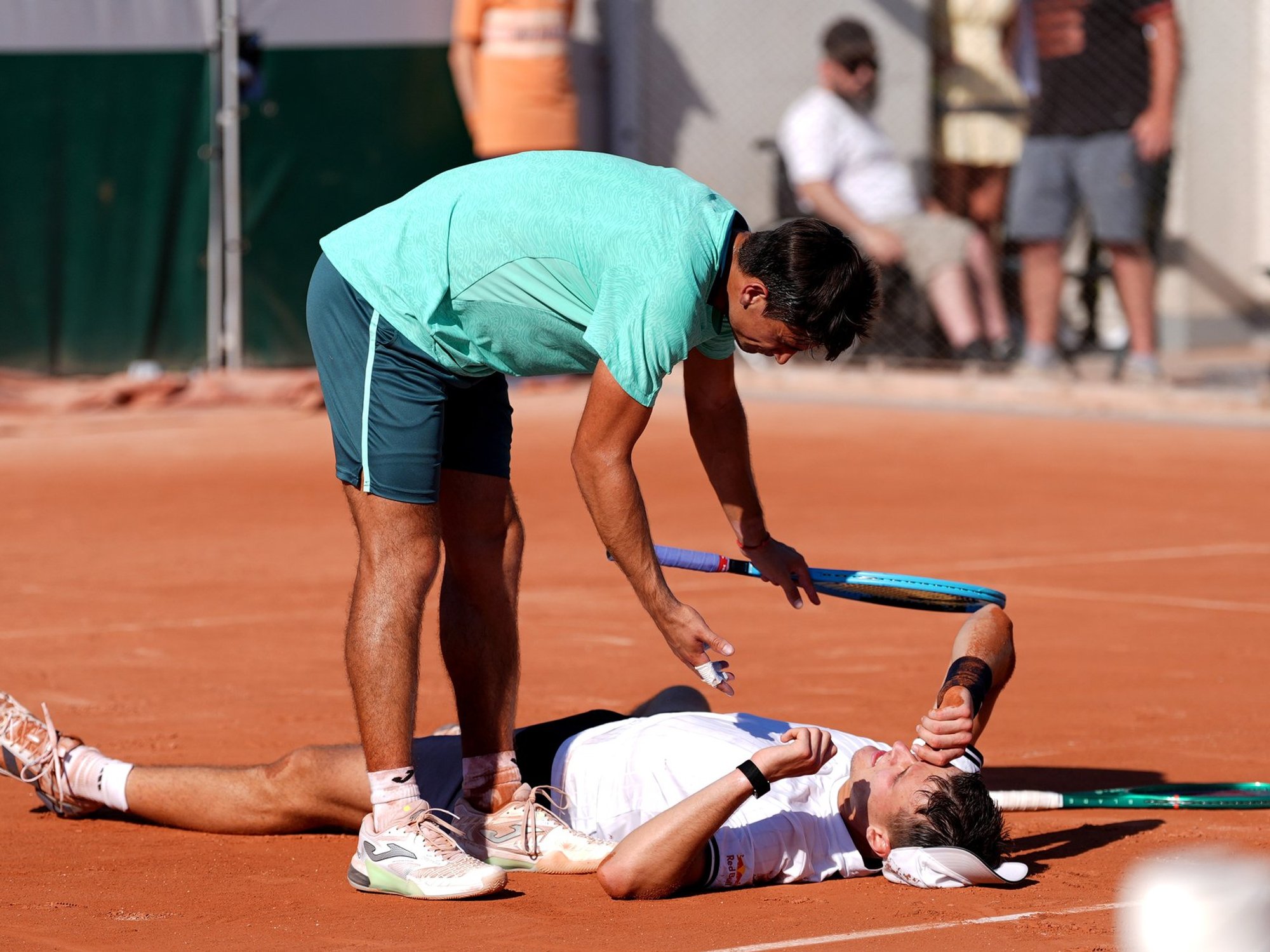 French Open star collapses and needs wheelchair to come off court