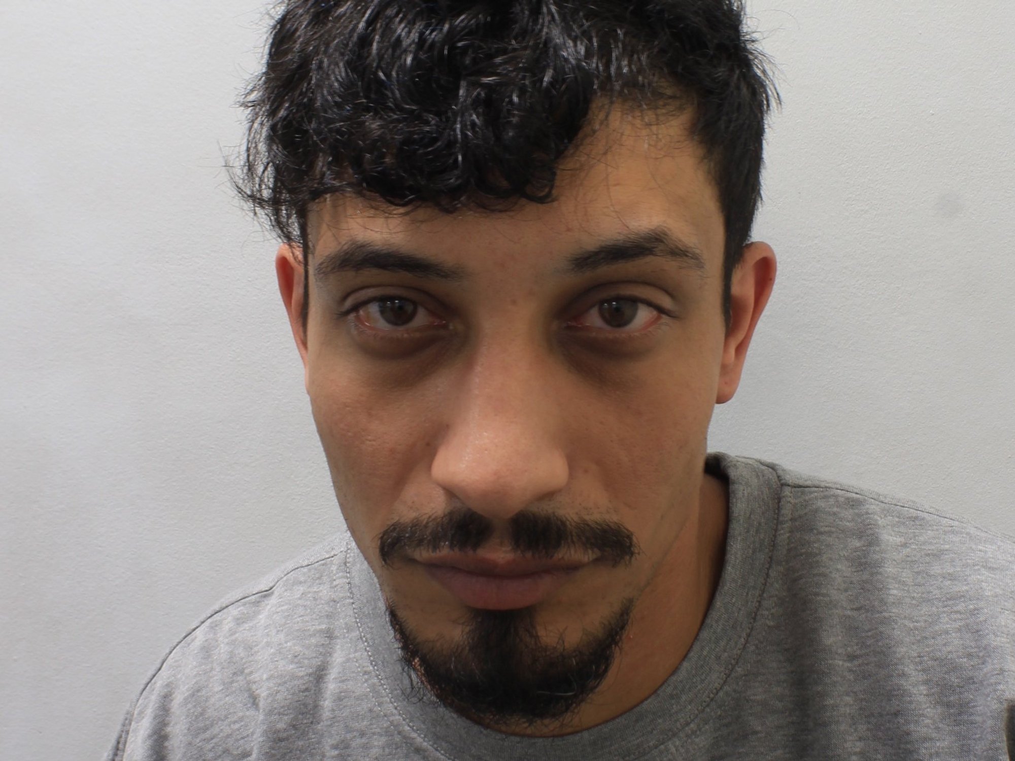 'Bisexual' Iraqi asylum seeker who arrived in UK on small boat jailed for raping woman at hostel