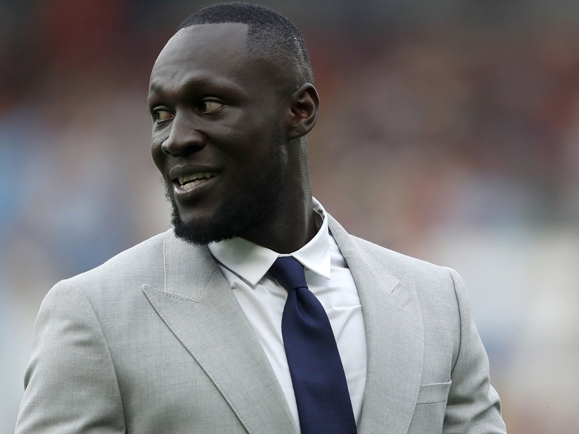 Stormzy slapped with fine after rapper spotted using phone while driving £400k Ferrari