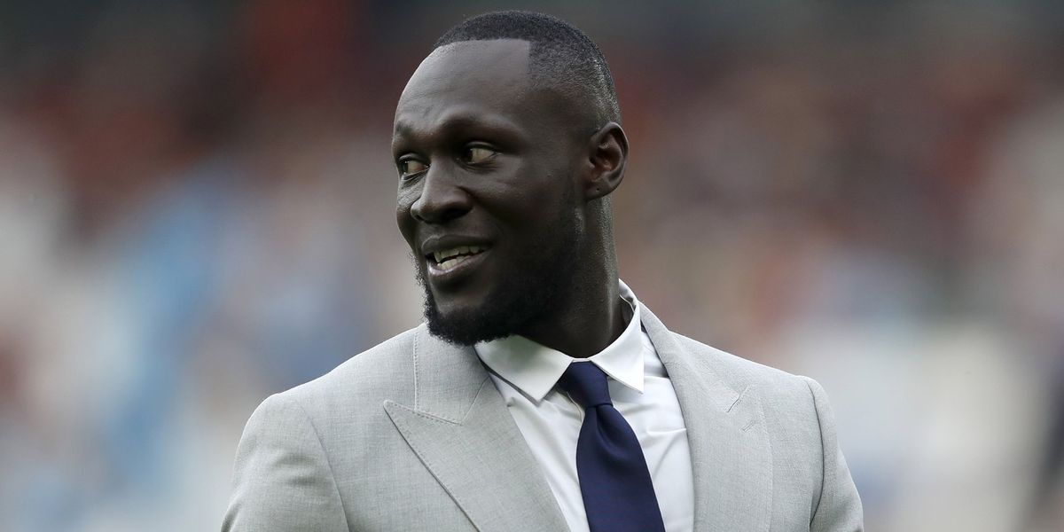 Stormzy slapped with fine after rapper spotted using phone while driving £400k Ferrari Stormzy slapped with fine after rapper spotted using phone while driving £400k Ferrari