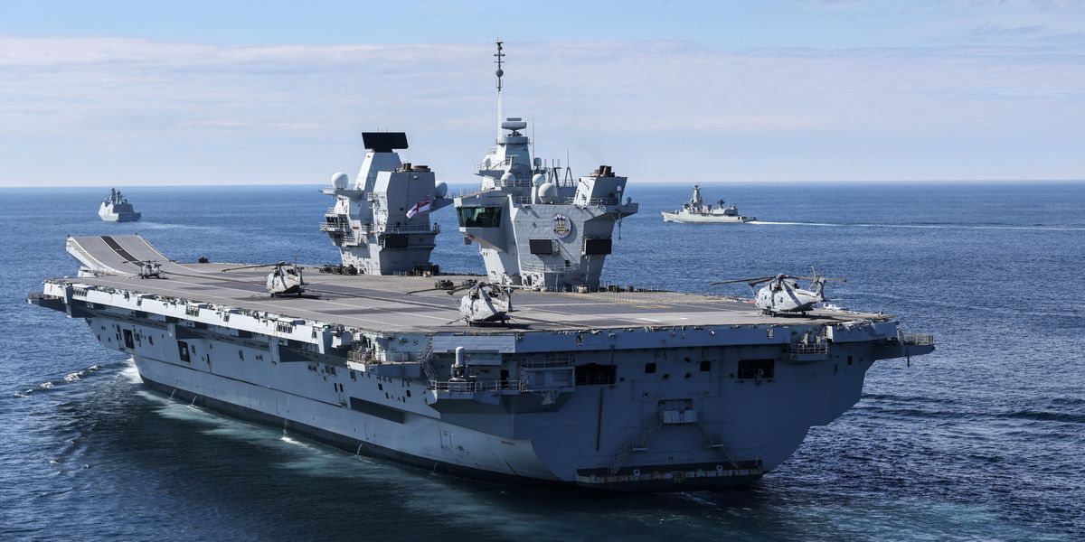Royal Navy's flagship aircraft carrier left 'marooned' after breaking down AGAIN