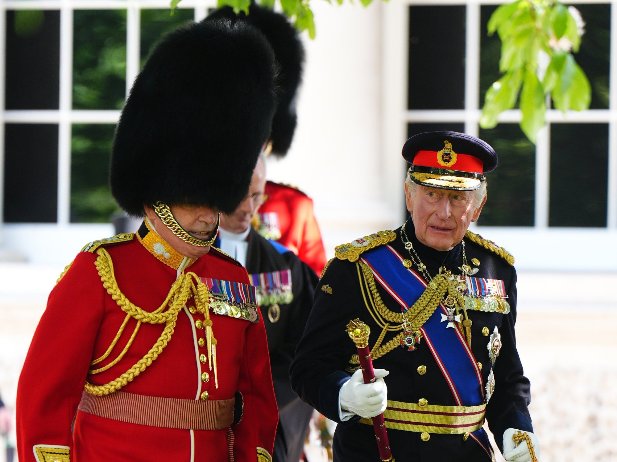 King Charles and Queen Camilla present new Colours at Buckingham Palace