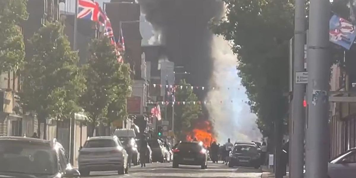 Belfast bus set on fire as hundreds stage protest after Sudanese migrant charged with attempted murder Belfast bus set on fire as hundreds stage protest after Sudanese migrant charged with attempted murder