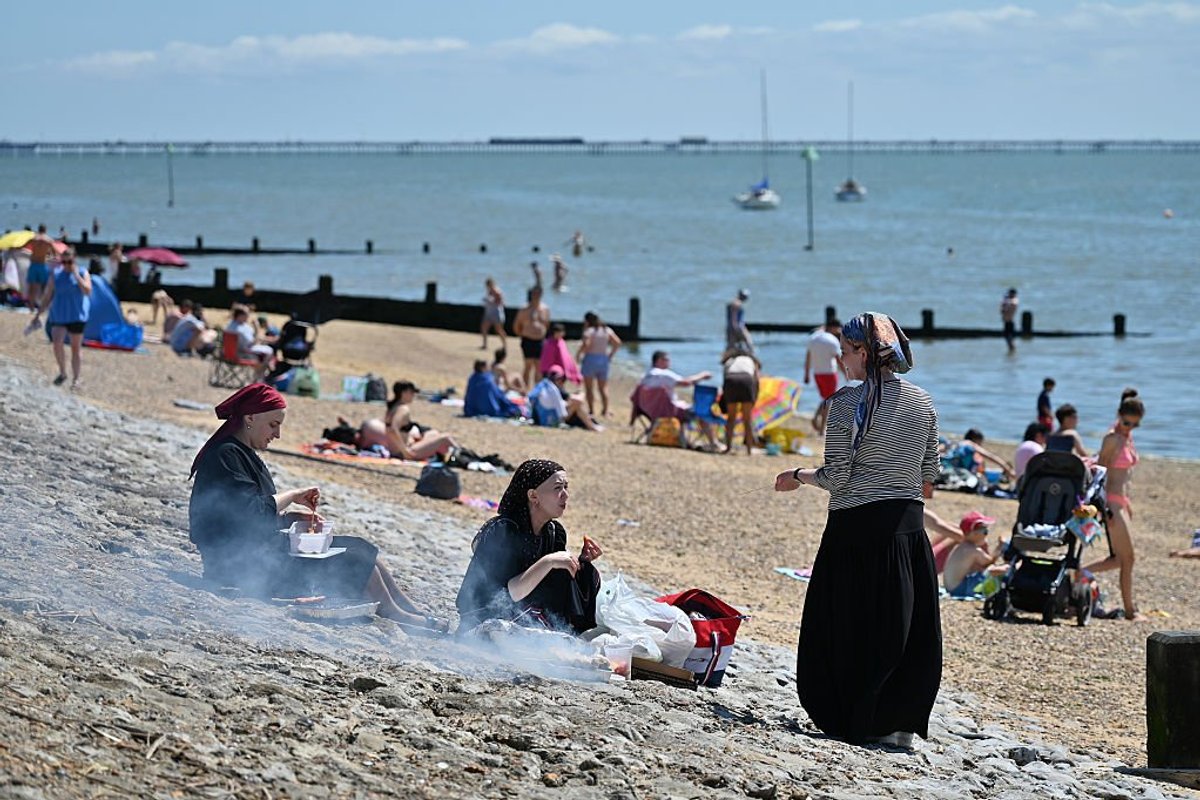 Britons warming up for summer’s first BBQ weekend as thunder and rain give way