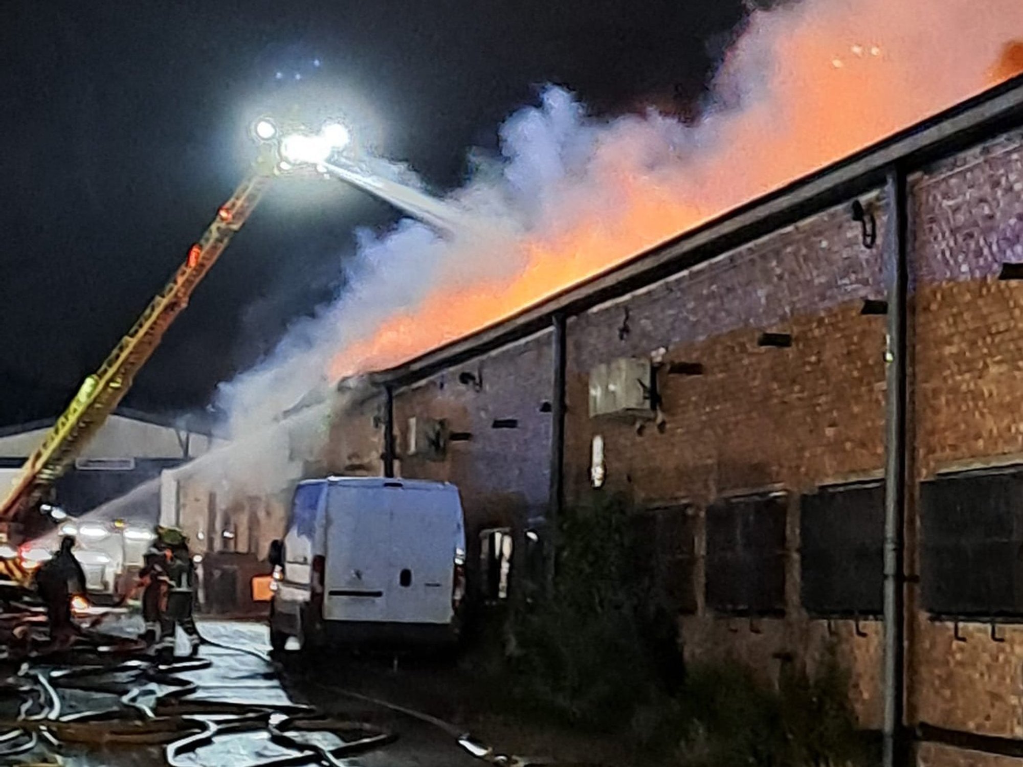Nearly 100 people evacuated as huge late-night fire rips through estate in London