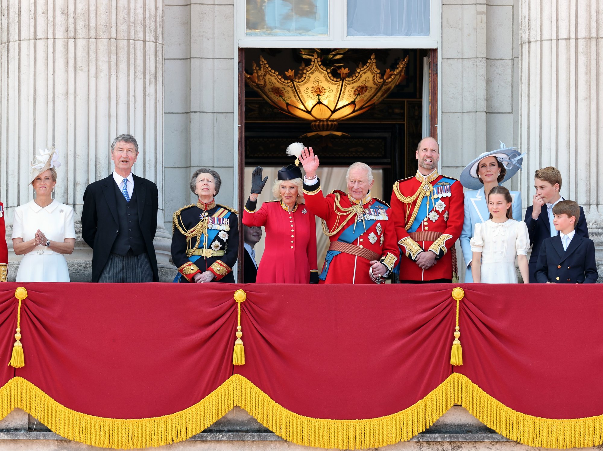 King leads slimmed-down royals on Buckingham Palace balcony as Britain celebrates monarch's offic...