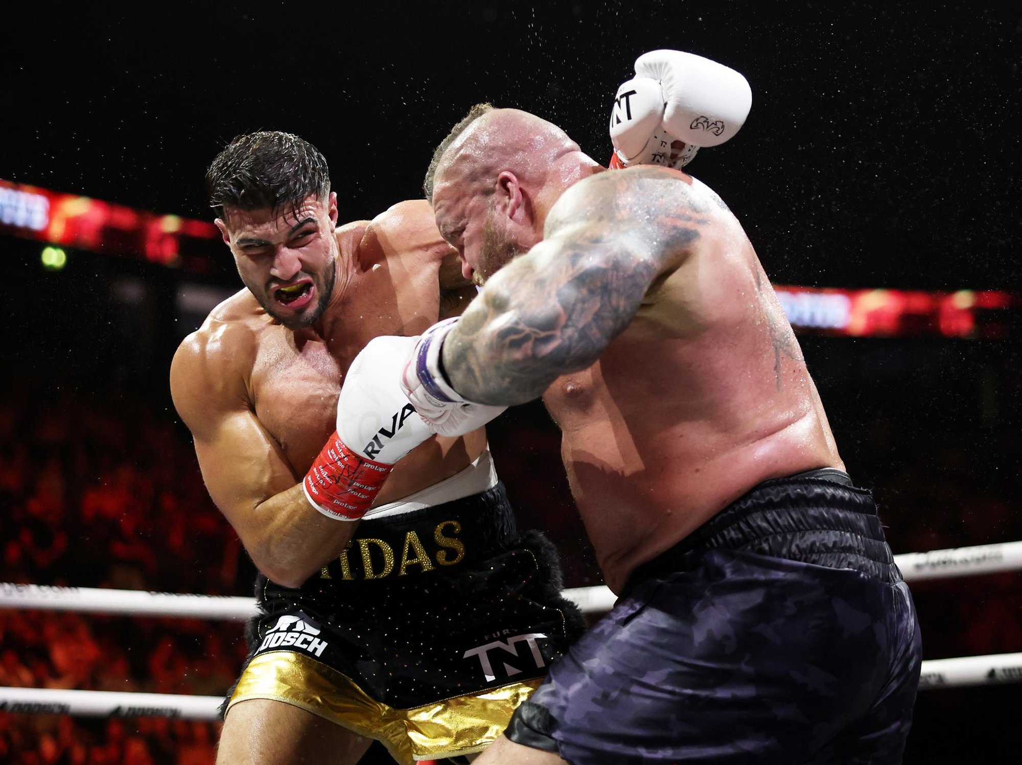 Tommy Fury beats strongman Eddie Hall in boxing's latest circus show as Tyson Fury cheers on