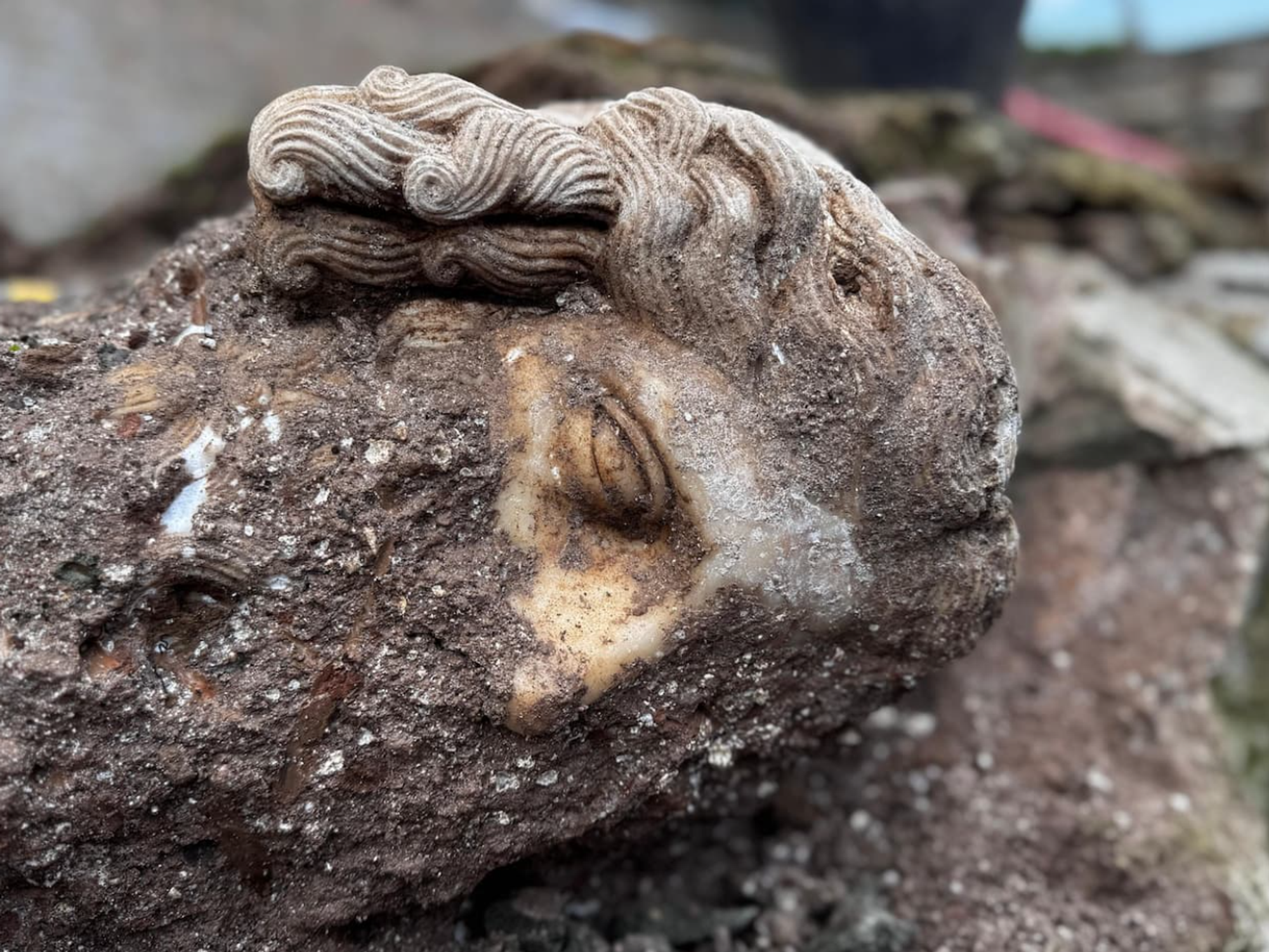Archaeologists find mysterious Roman deity head beneath historic church