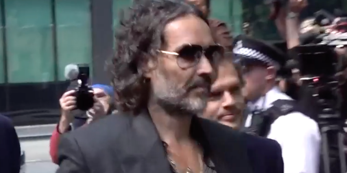 NextImg:WATCH: Russell Brand arrives at court to enter pleas to rape and sexual assault charges