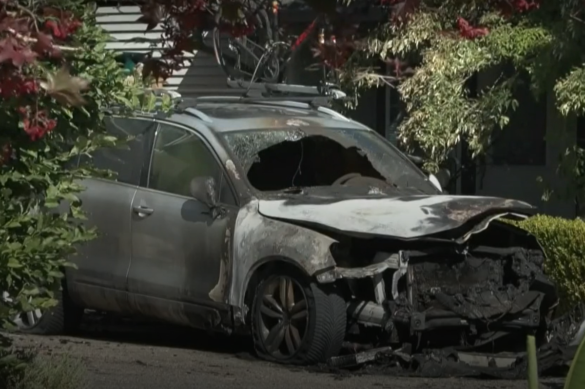 Neighbour row leaves couple and their dog dead as two vehicles engulfed in flames