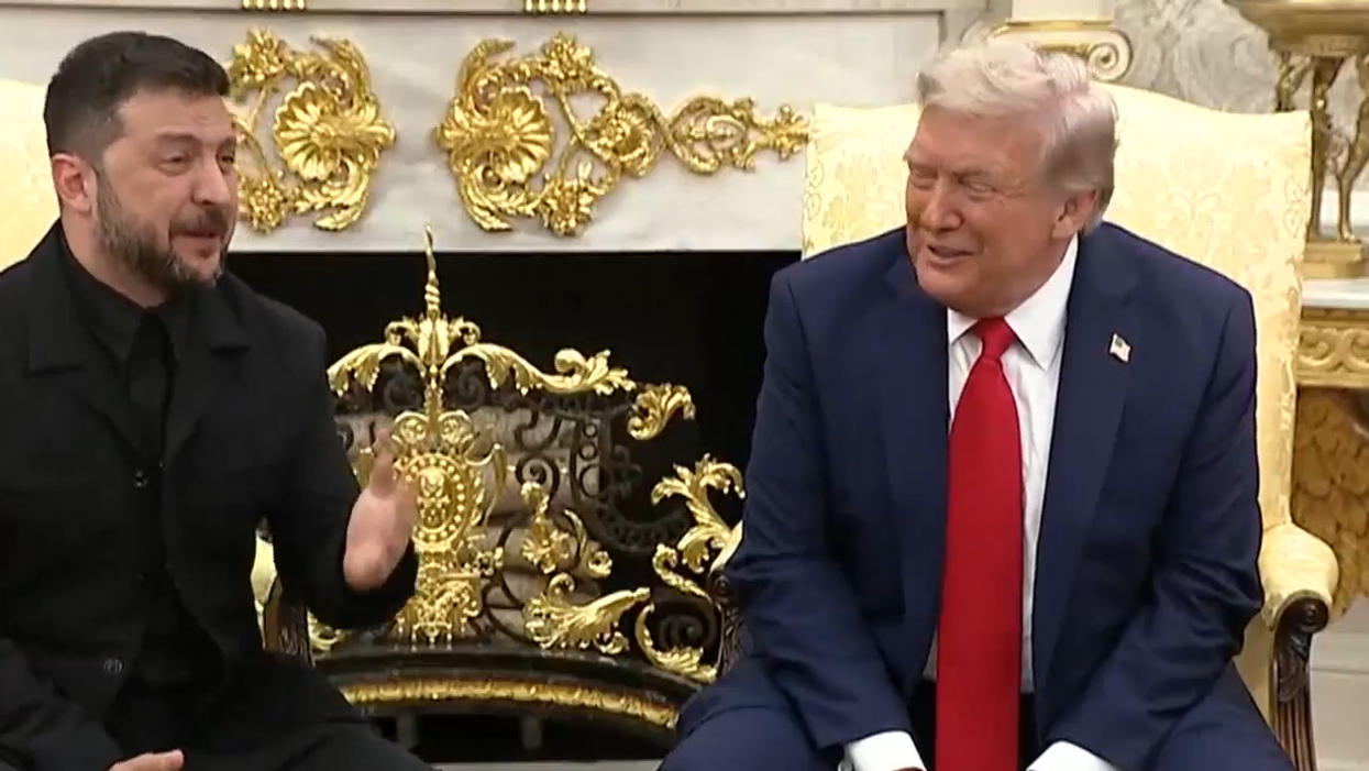 Moment reporter who ‘attacked’ Volodymyr Zelensky’s attire builds bridges as he tells Ukrainian P...