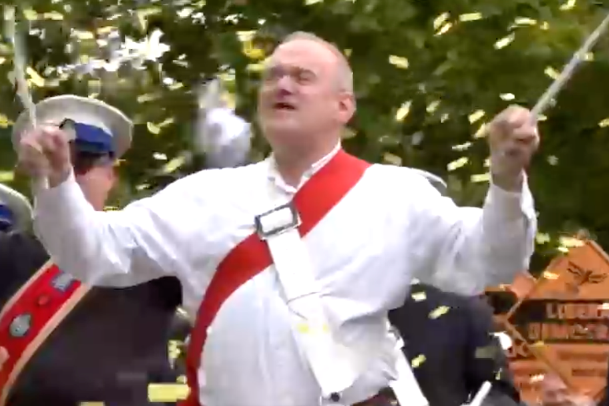 Ed Davey arrives for Liberal Democrats’ party conference with a marching band and message of ‘reclaiming patriotism’