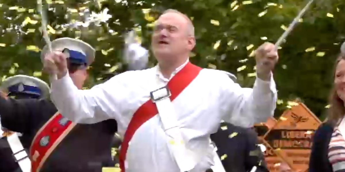 NextImg:Ed Davey arrives for Lib Dem conference with a marching band and message of ‘reclaiming patriotism’