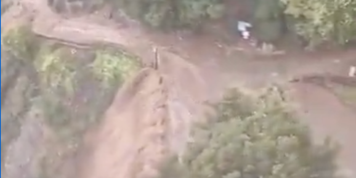 NextImg:Child dead after horror floods hit tourist hotspot as airlines forced to cancel flights