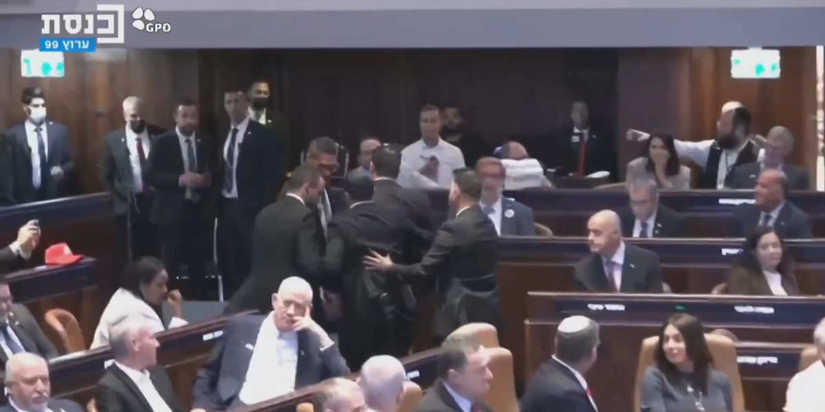 NextImg:Protester charges towards Donald Trump during speech to Israeli parliament in security scare
