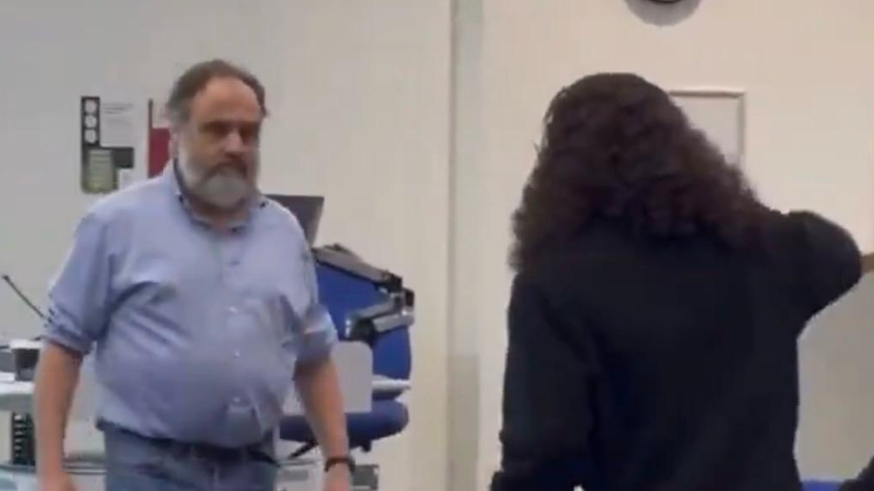 Masked pro-Palestine mob 'threatens to behead UK university professor'