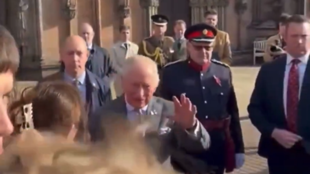 King Charles confronted by protester over Andrew and Epstein's friendship during royal engagement