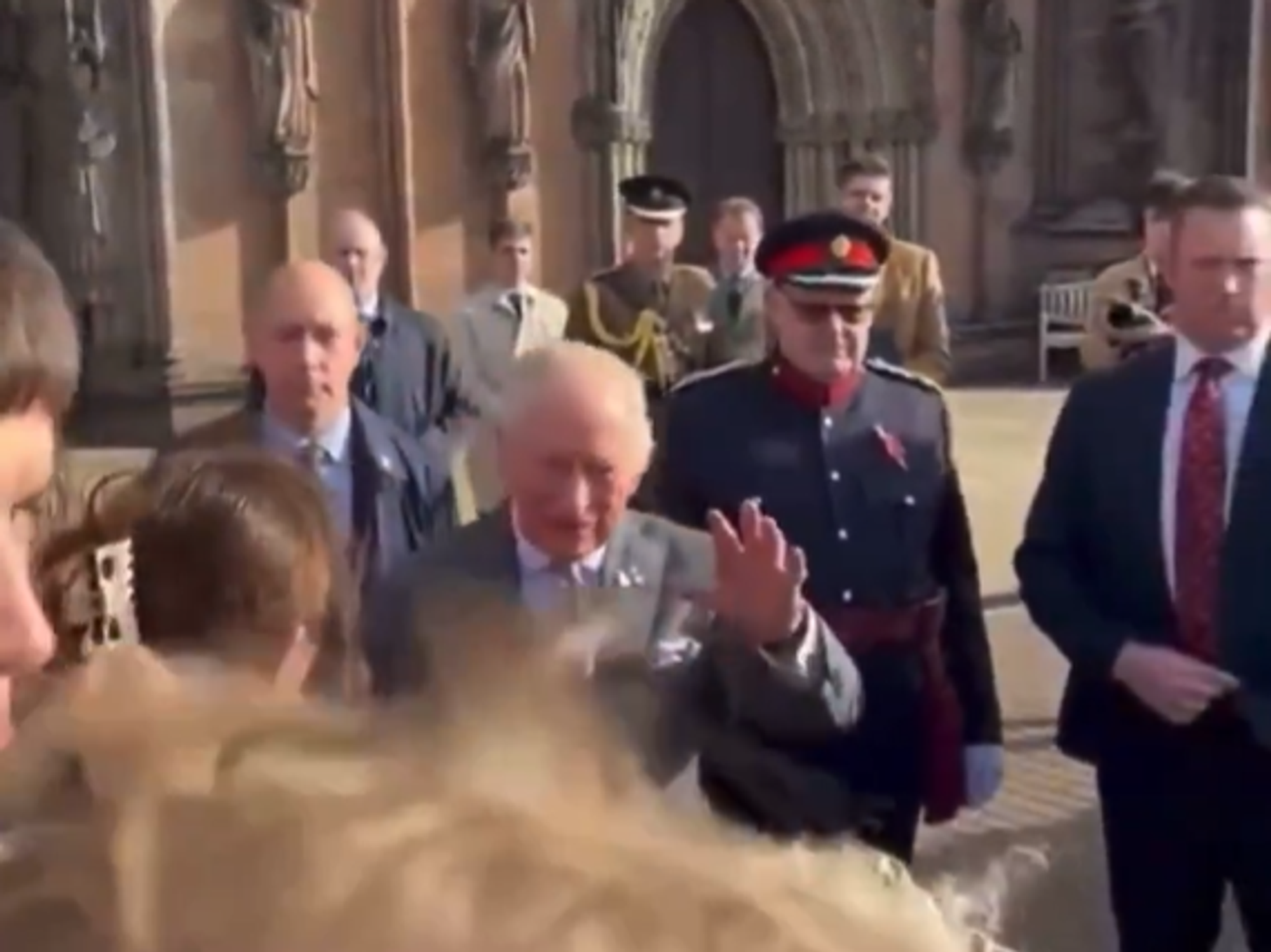 King Charles confronted by protester over Andrew and Epstein's friendship during royal engagement