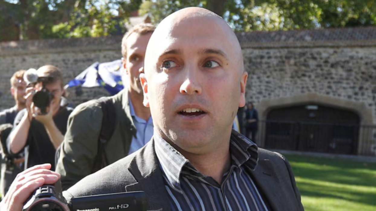 British 'Kremlin mouthpiece' faces Met Police war crimes probe after filming sick videos in Ukraine