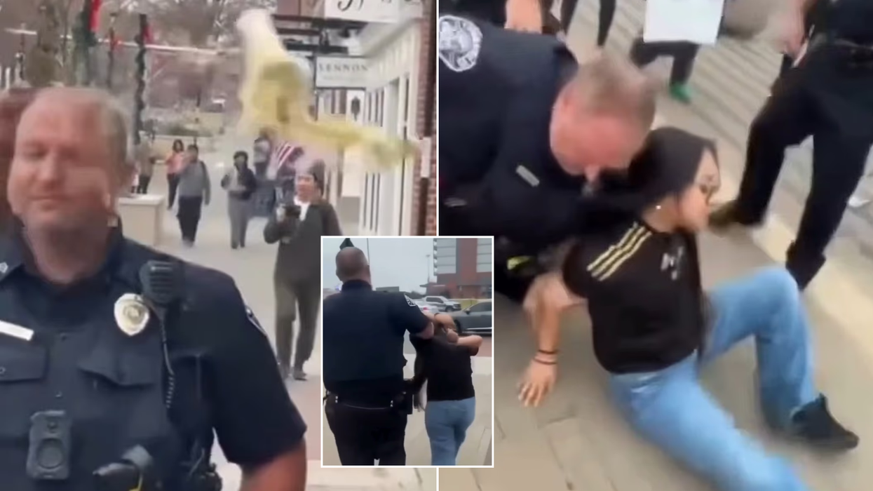 Teenage yob handed instant justice after hurling drink at police officer at US protest