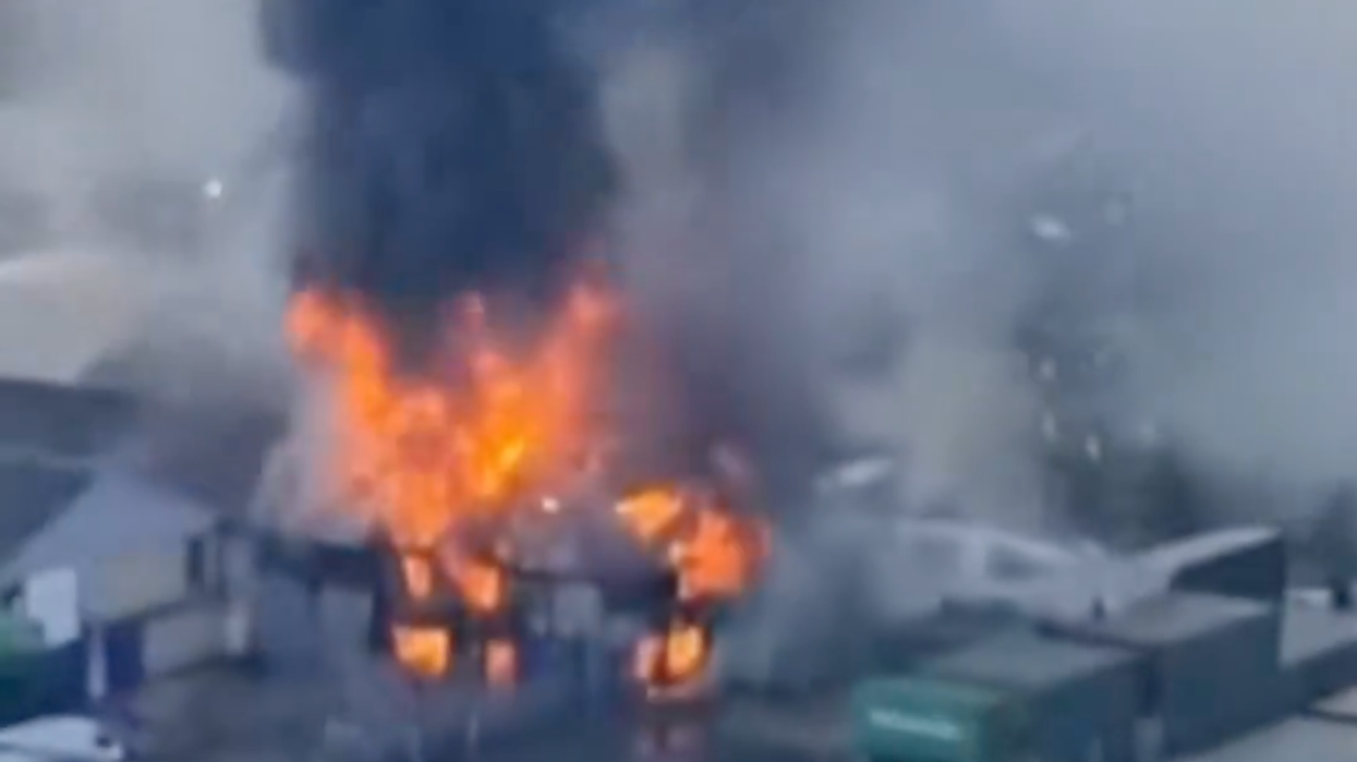 Loud bangs heard as huge blaze erupts in London and thick plumes of smoke engulf skyline seen for miles