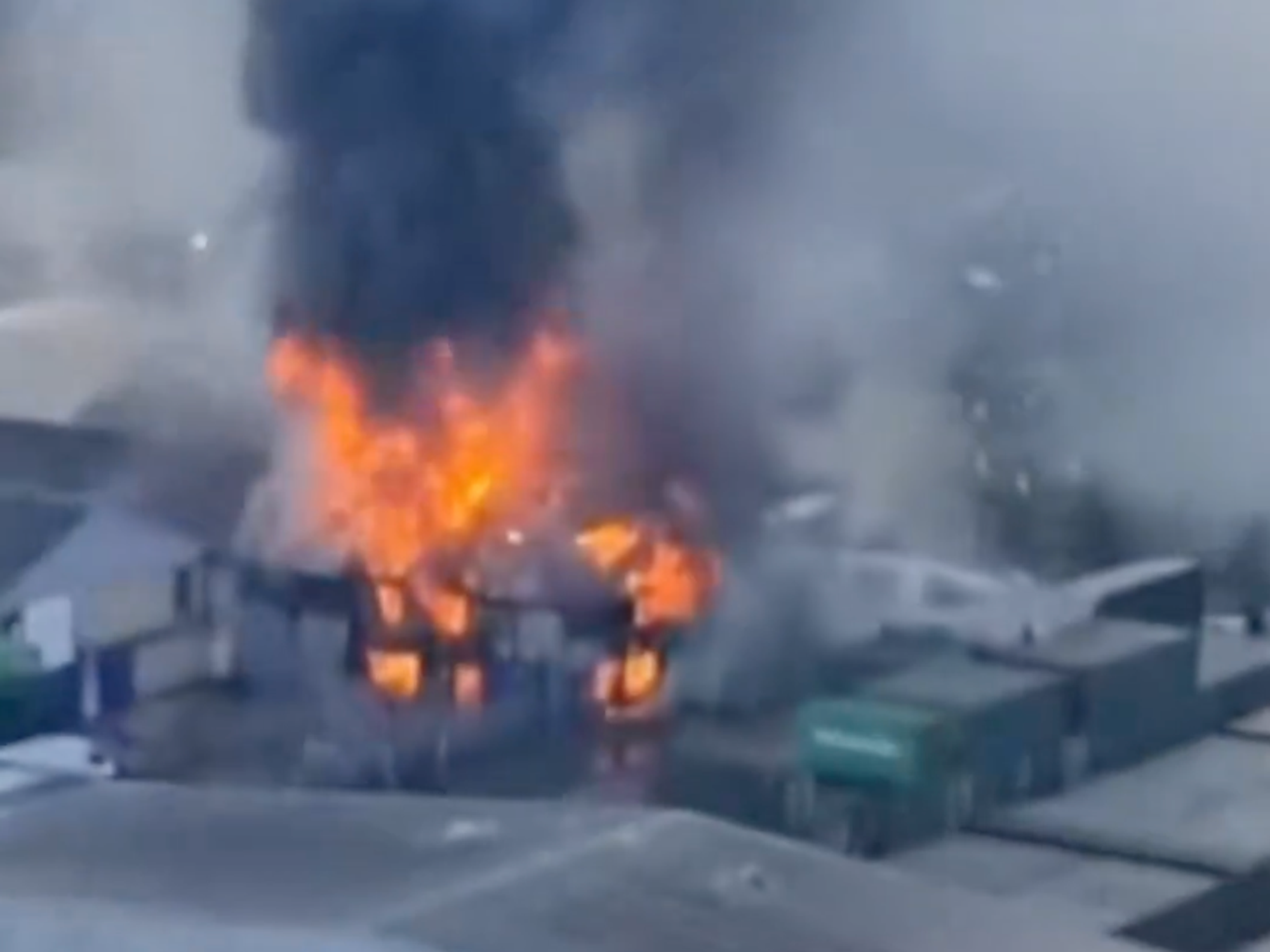 Loud bangs heard as huge blaze erupts in London and thick plumes of smoke engulf skyline seen for miles