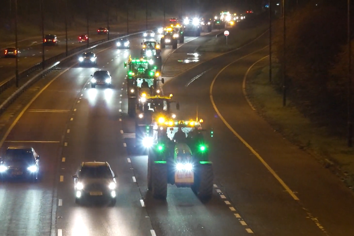 Watch as columns of tractors roll down M4 as furious farmers head to London for Budget protest