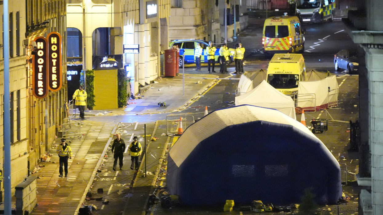 Liverpool parade attacker who drove car into fans celebrating Premier League title win now pleads guilty and sobs in court