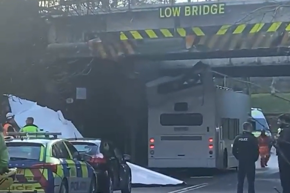 Multiple children injured as bus roof ripped off after horror crash into bridge