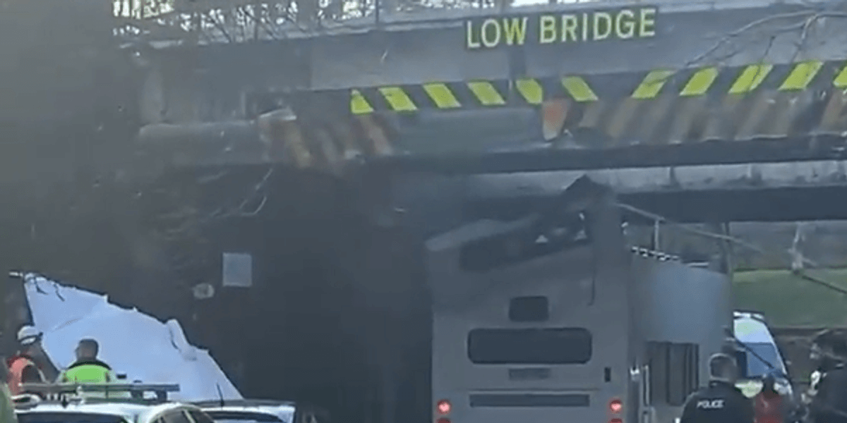 Multiple children injured as bus roof ripped off after horror crash into bridge Multiple children injured as bus roof ripped off after horror crash into bridge