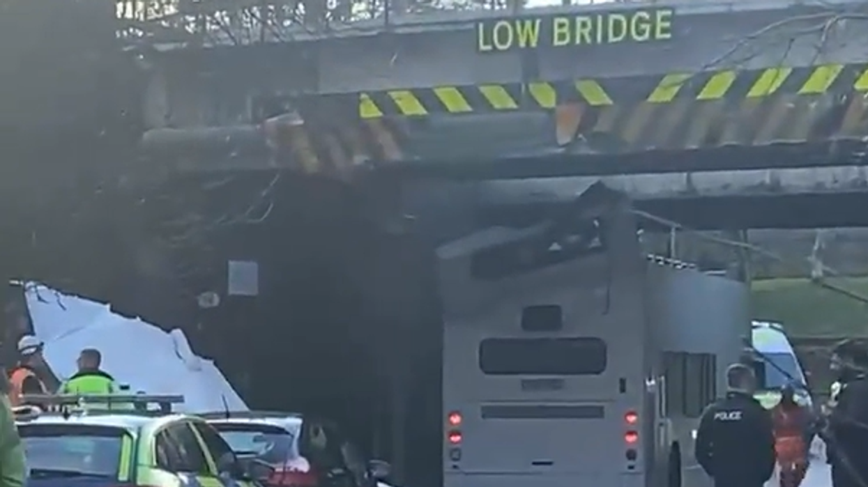 Multiple children injured as bus roof ripped off after horror crash into bridge
