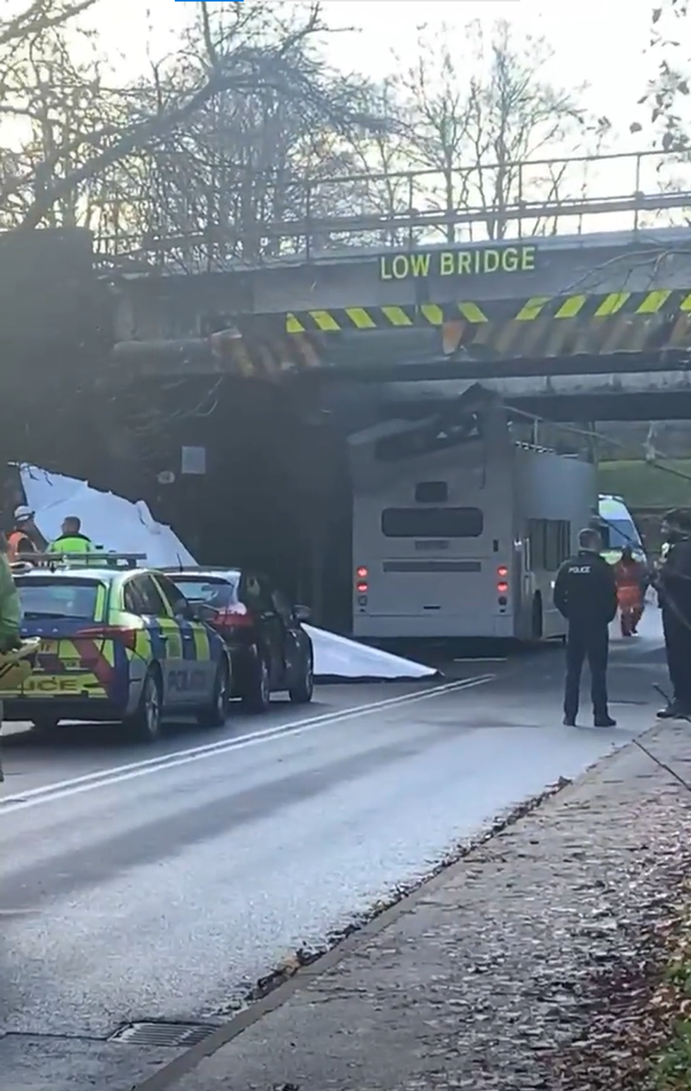 Multiple children injured as bus roof ripped off after horror crash into bridge
