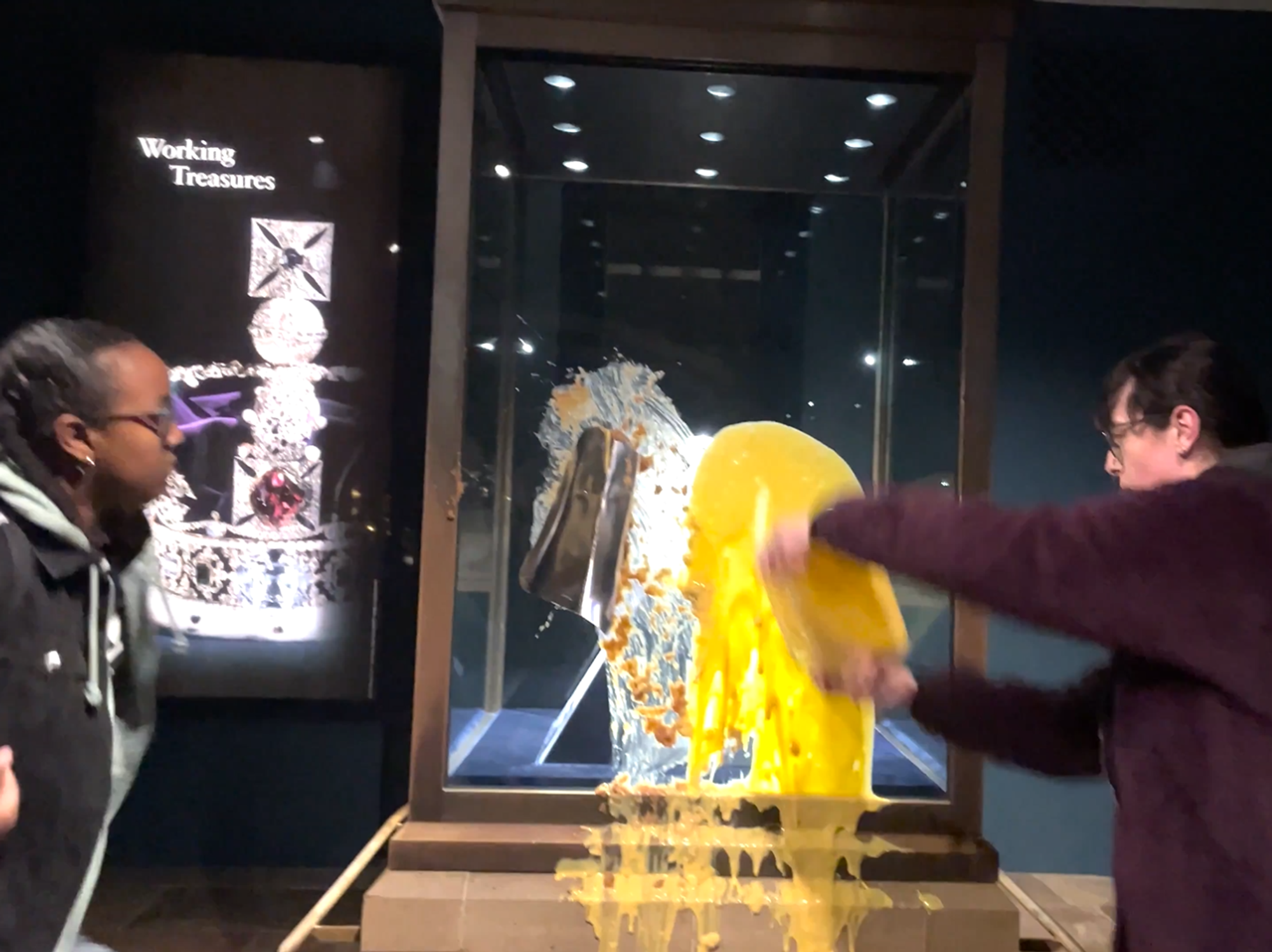 Tower of London closed and four protesters arrested after 'throwing food' at case displaying Crown Jewels