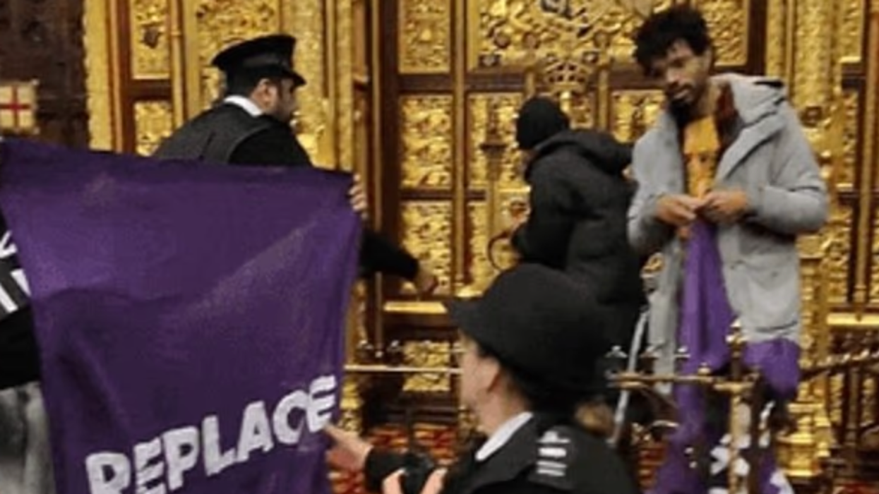 Left-wing protesters storm House of Lords barriers and target King's throne