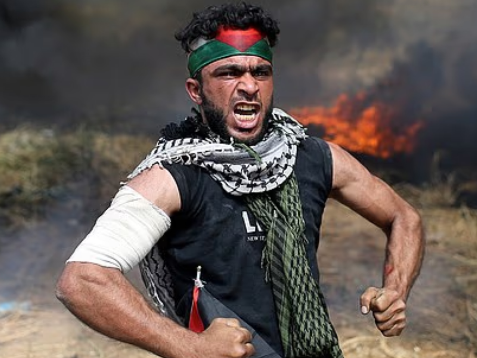 Gun-wielding Palestinian migrant who called for 'death to all Jews' released onto Britain's streets