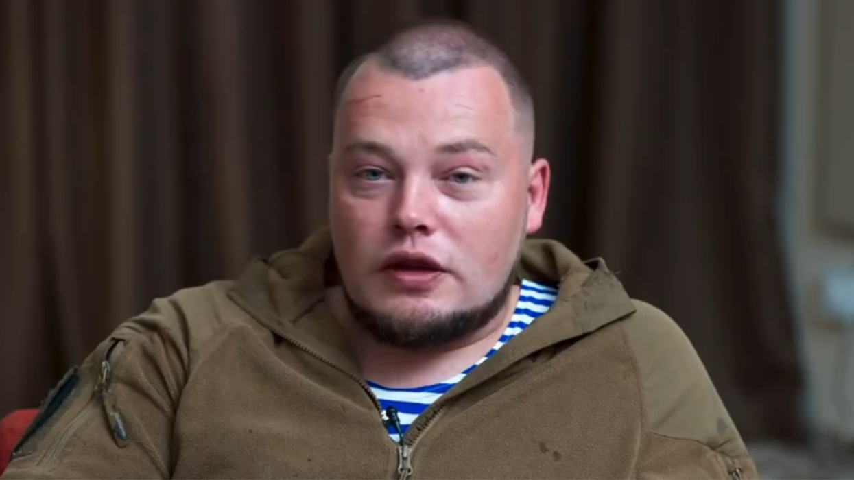 Russian neo-Nazi infamous for eating a puppy sent to teach children 'lesson in courage'