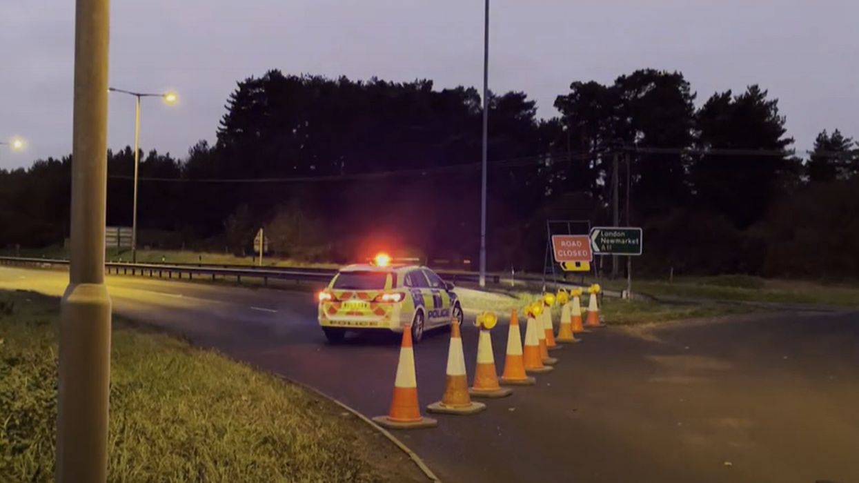 Driver shot dead by police after 'fleeing two-car crash brandishing handgun'