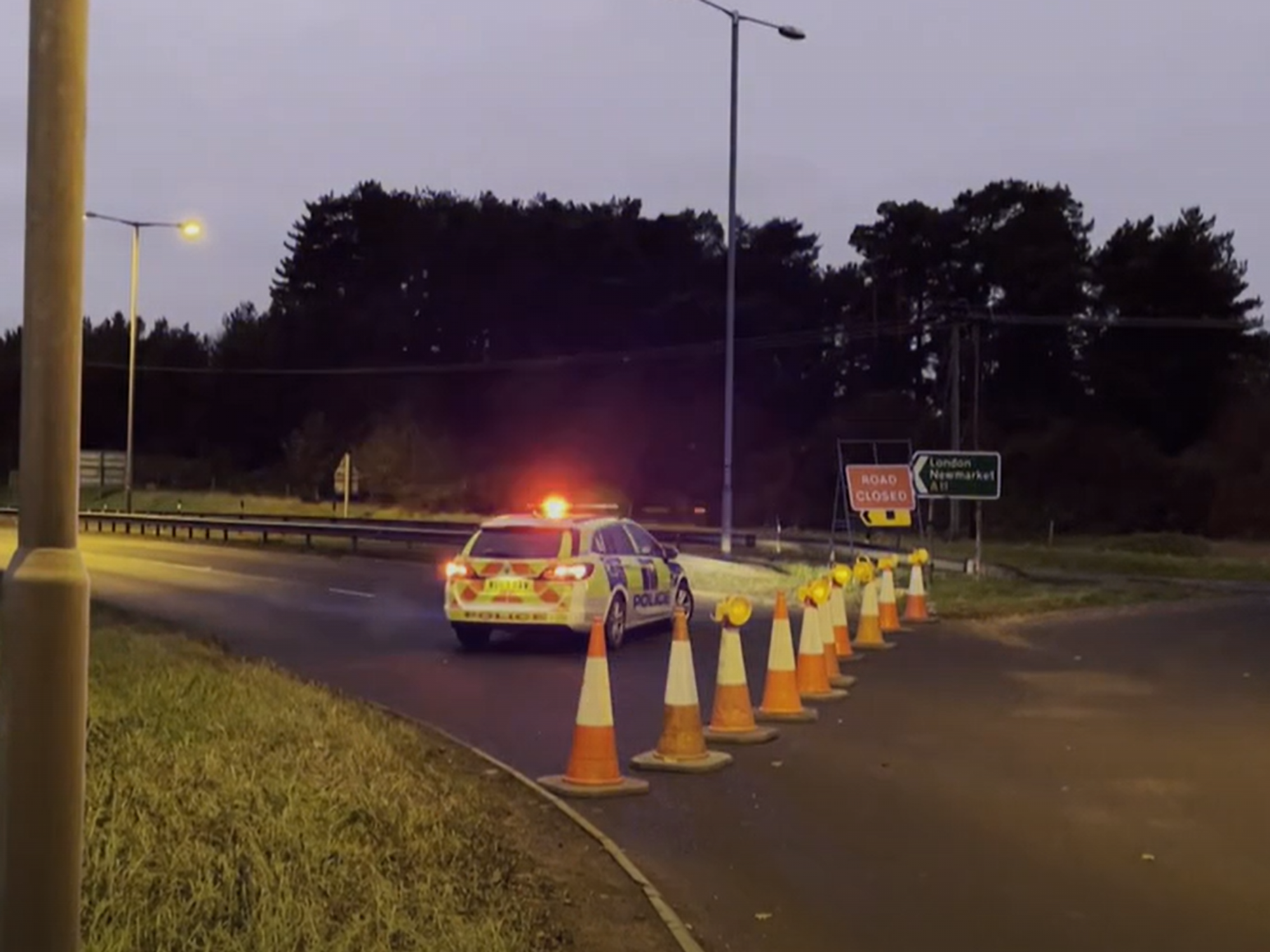 Driver shot dead by police after 'fleeing two-car crash brandishing handgun'