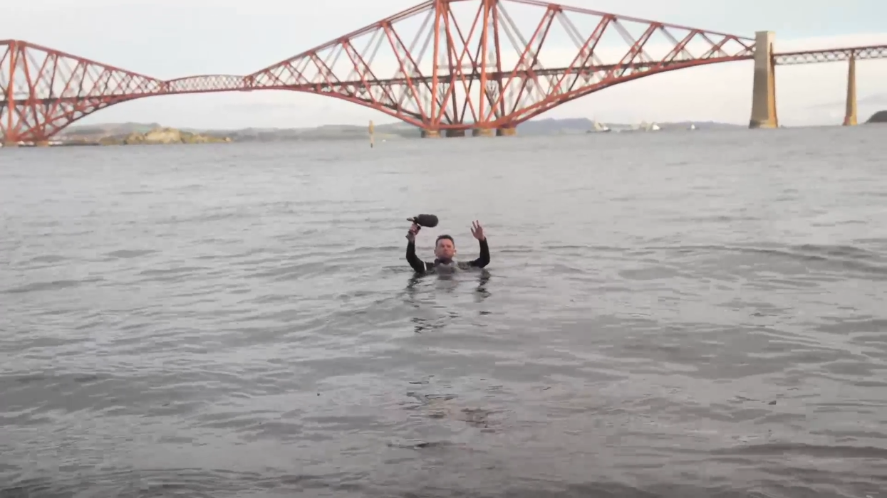 WATCH: Tony McGuire takes a New Year's plunge in the freezing Firth of Forth waters