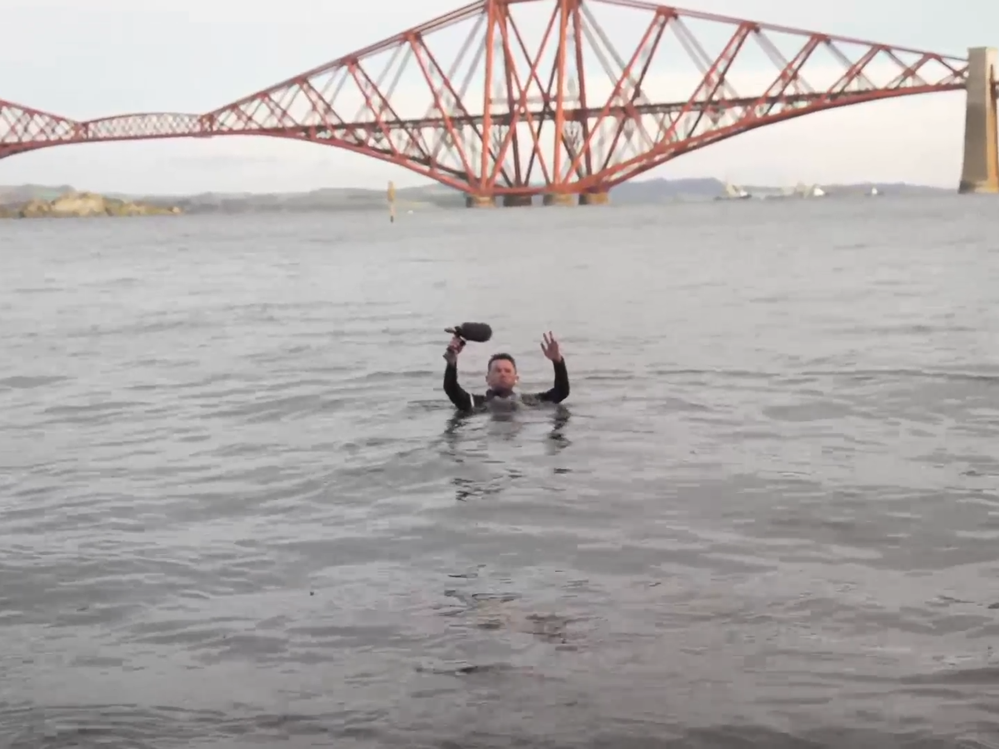 WATCH: Tony McGuire takes a New Year's plunge in the freezing Firth of Forth waters