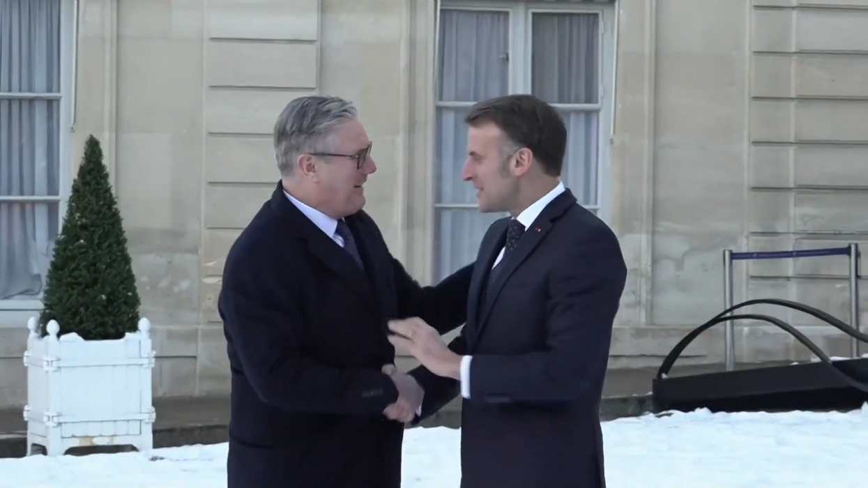 WATCH: Keir Starmer embraces Emmanuel Macron as...