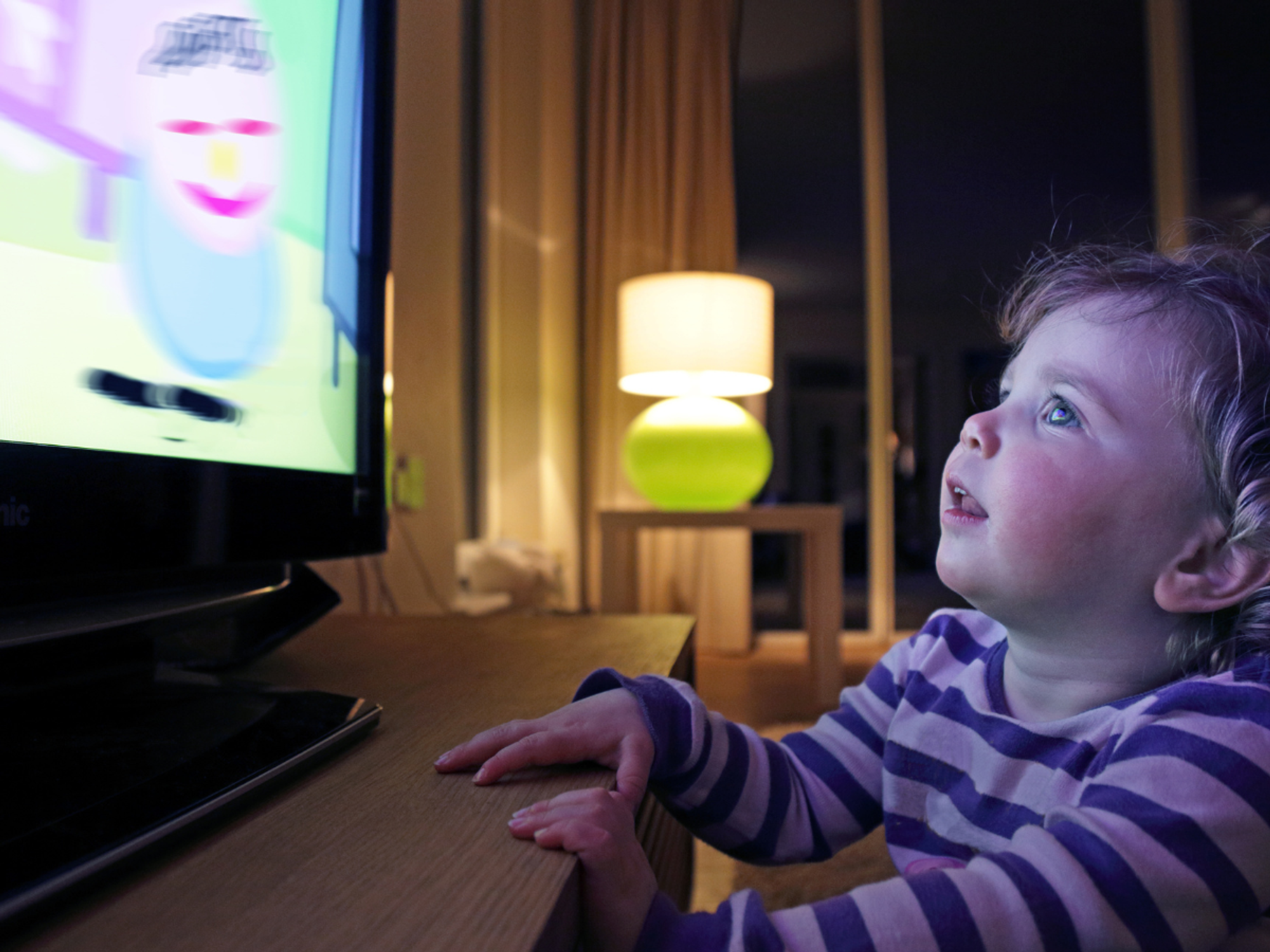 Britain's toddlers spend two hours every day watching screens